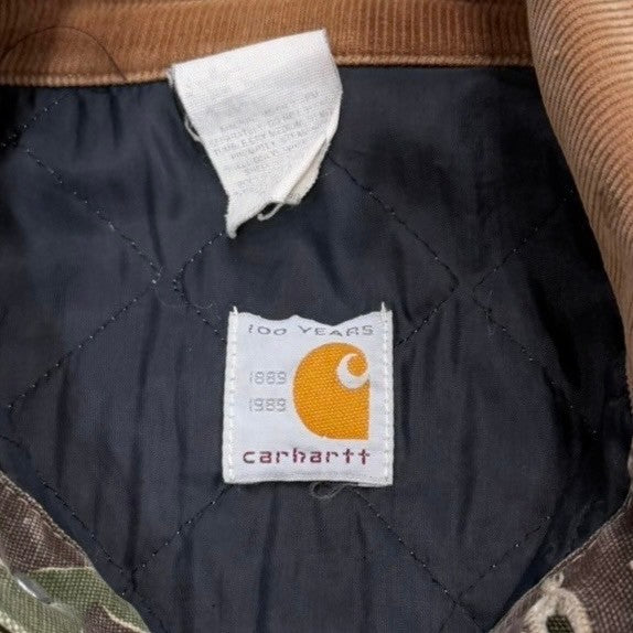 90’s “Carhartt”
camo pattern hunting jacket