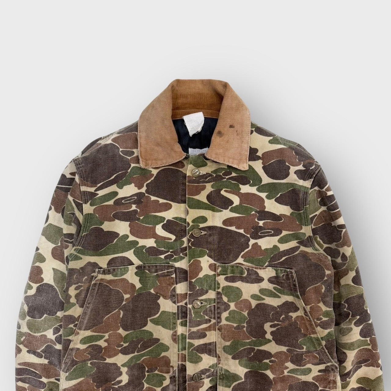 90’s “Carhartt”
camo pattern hunting jacket