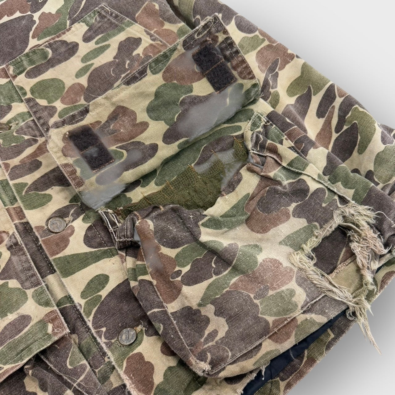 90’s “Carhartt”
camo pattern hunting jacket