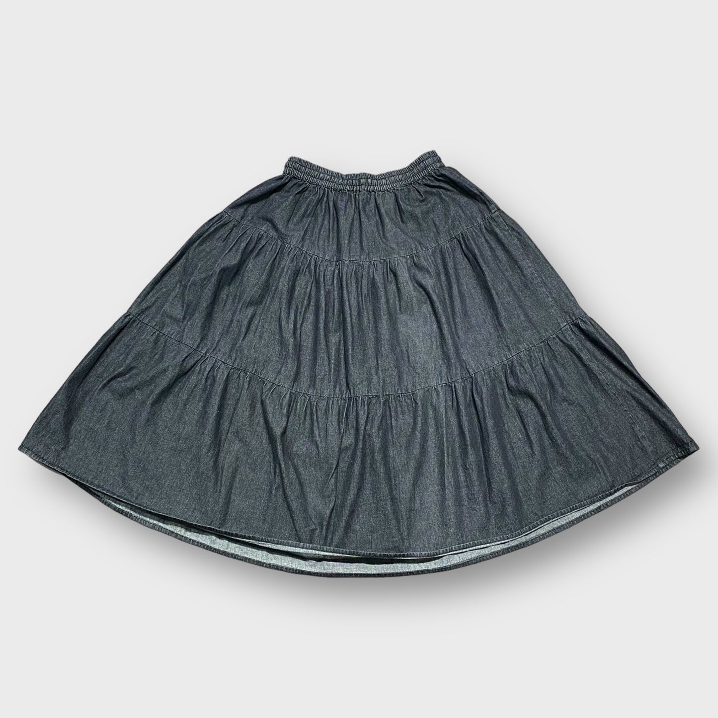 Metallic color middle length skirt