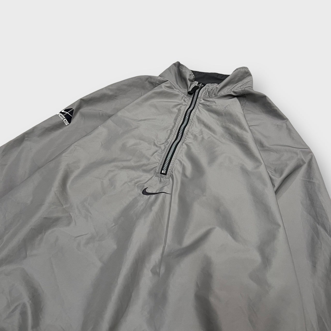 00's "NIKE ACG"
Half zip nylon jacket