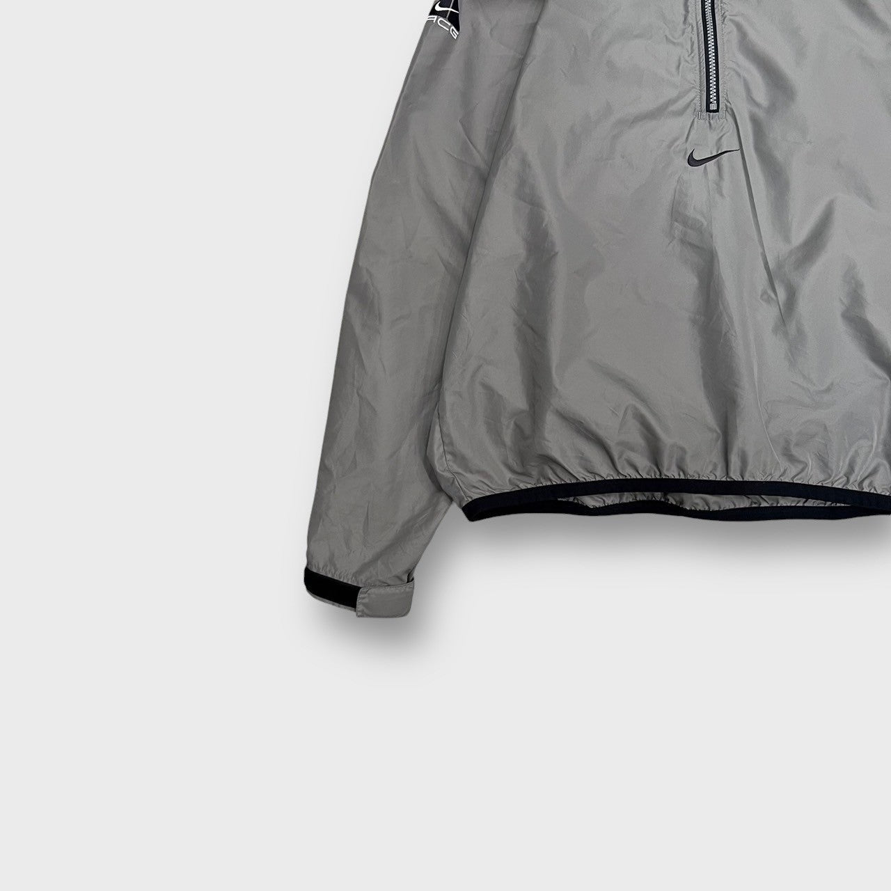 00's "NIKE ACG"
Half zip nylon jacket