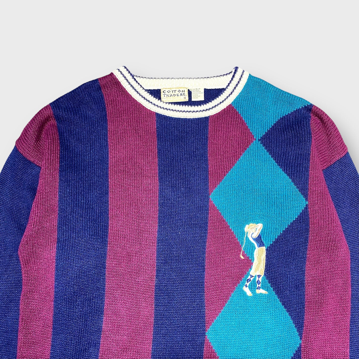 Stripe × argyle pattern golf knit sweater