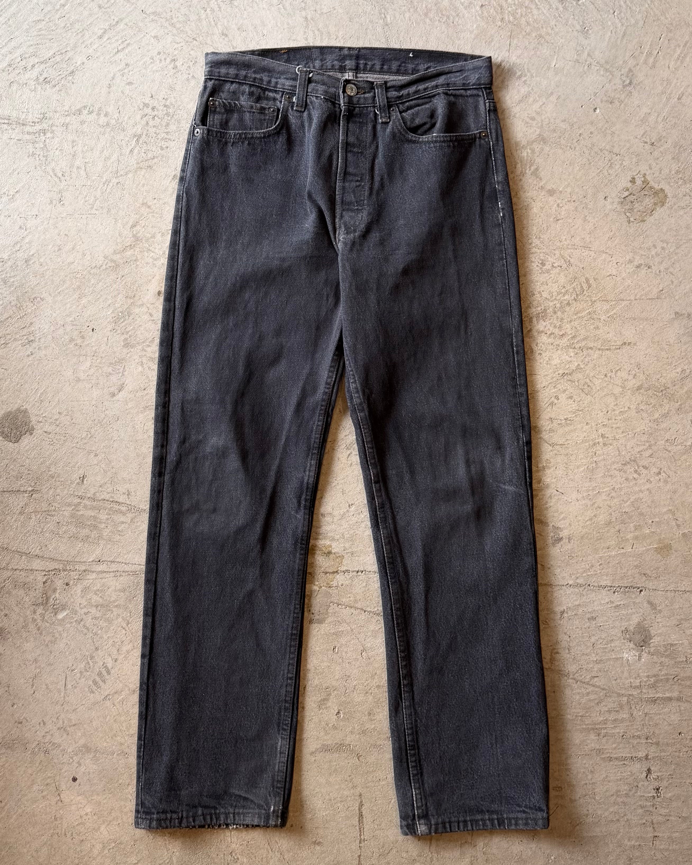 90’s LEVI’S
“501” first dyed black denim