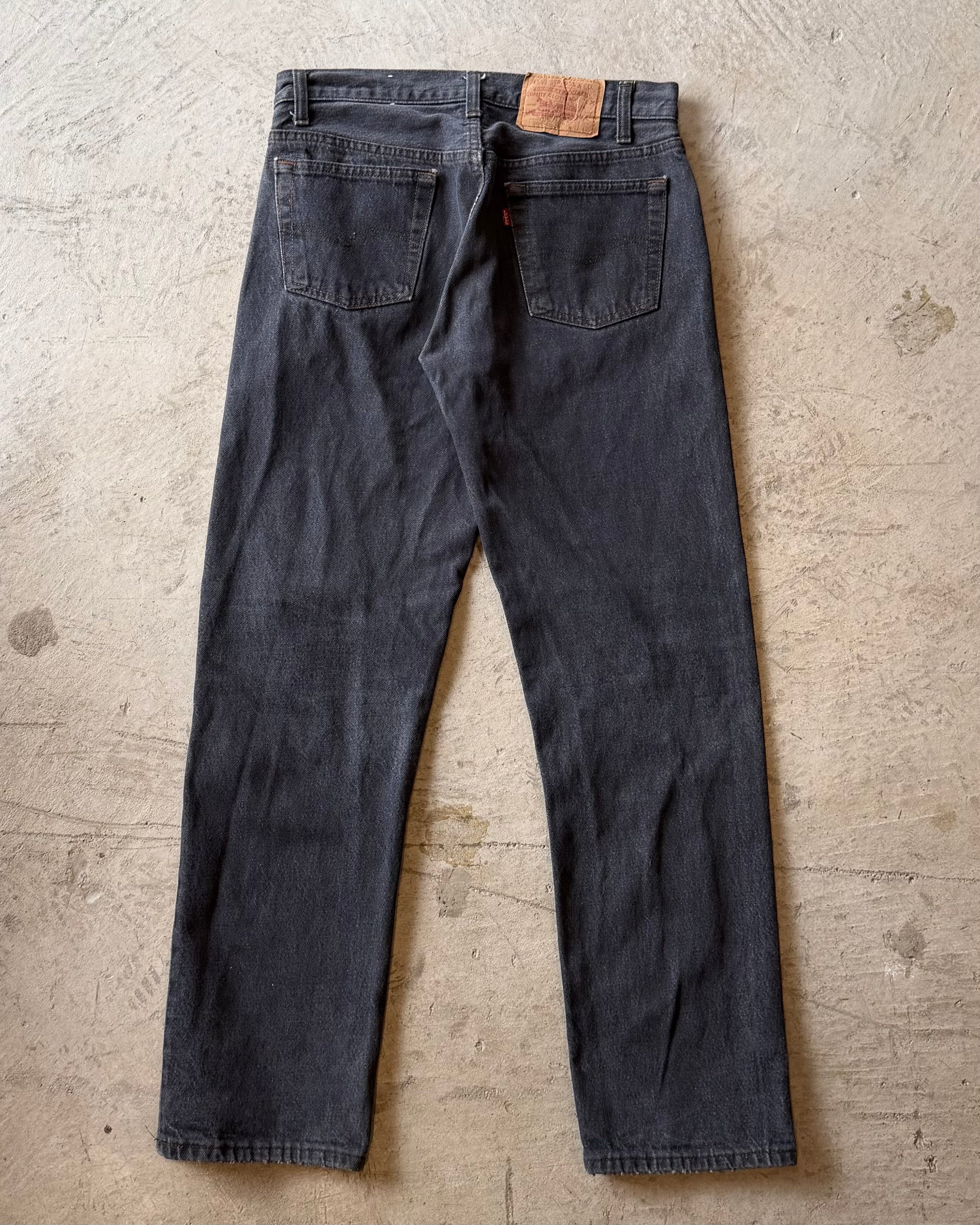 90’s LEVI’S
“501” first dyed black denim