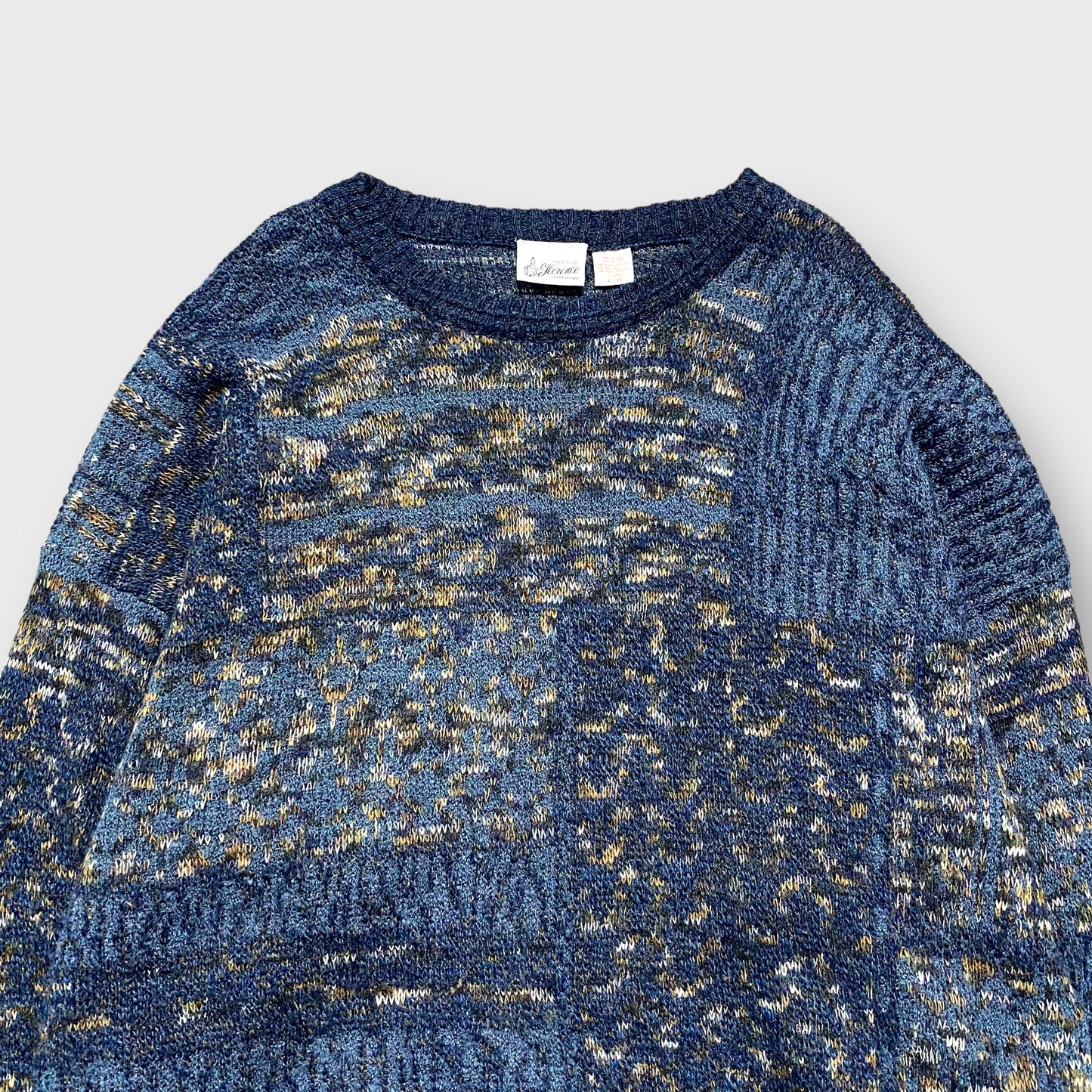Multi pattern knit sweater