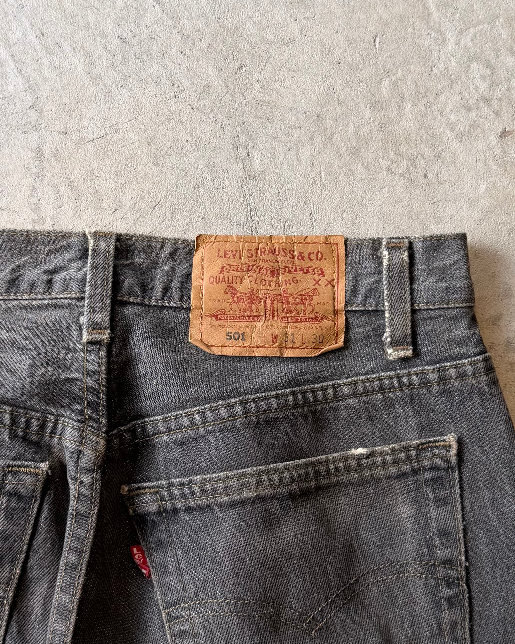 90’s LEVI’S
“501” first dyed black denim 31×30