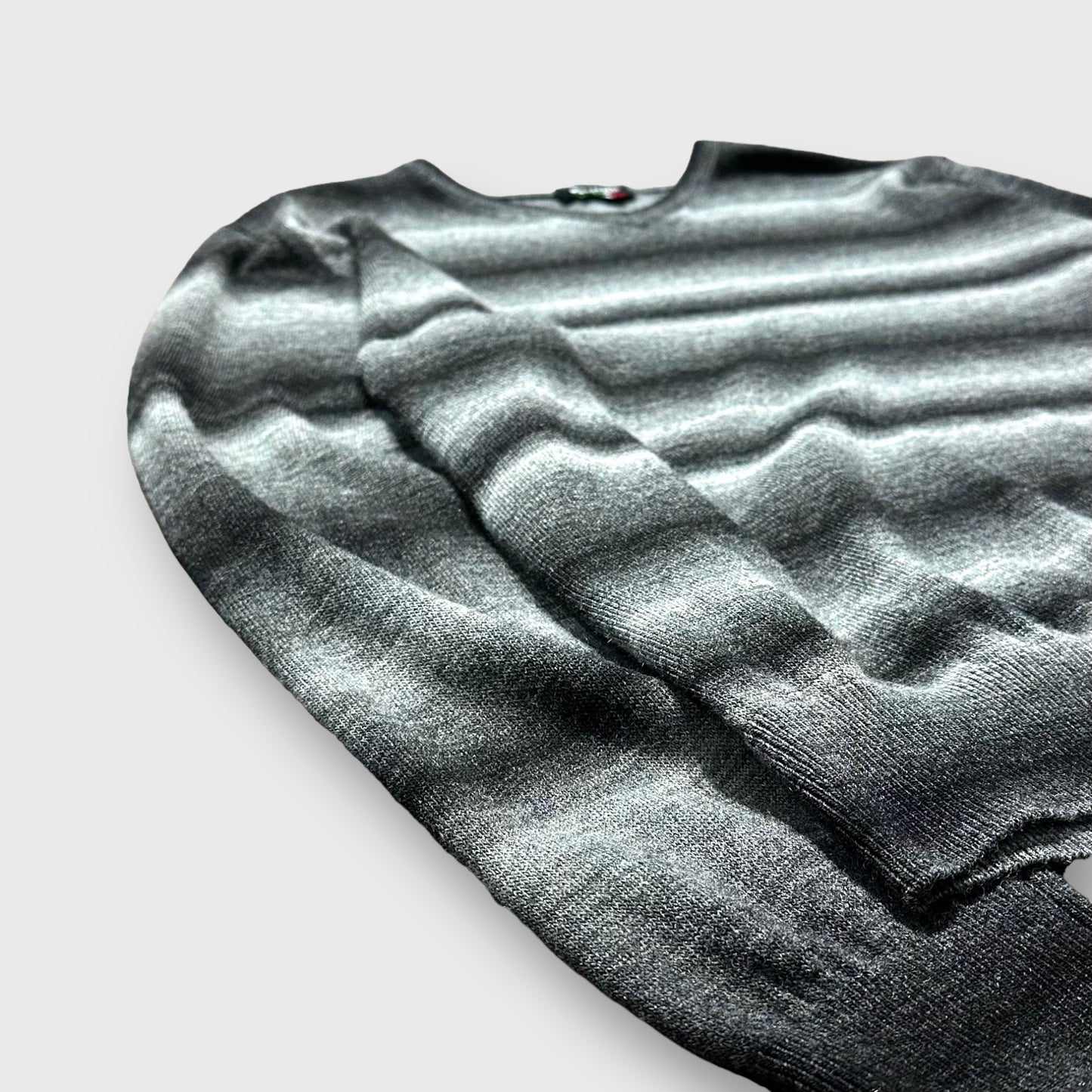 Border pattern gradation knit sweater