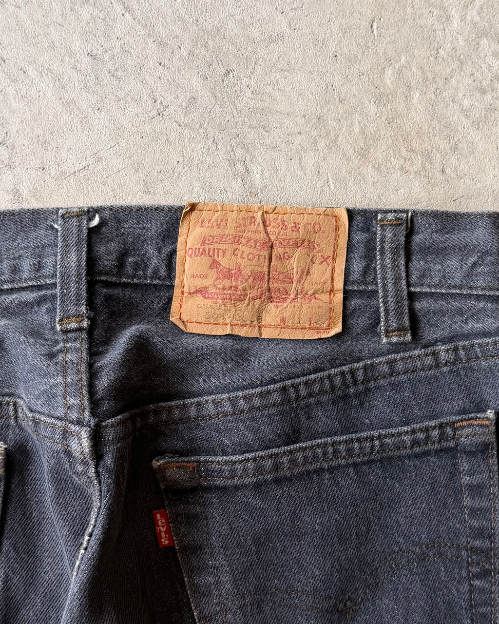 90’s LEVI’S
“501” first dyed black denim