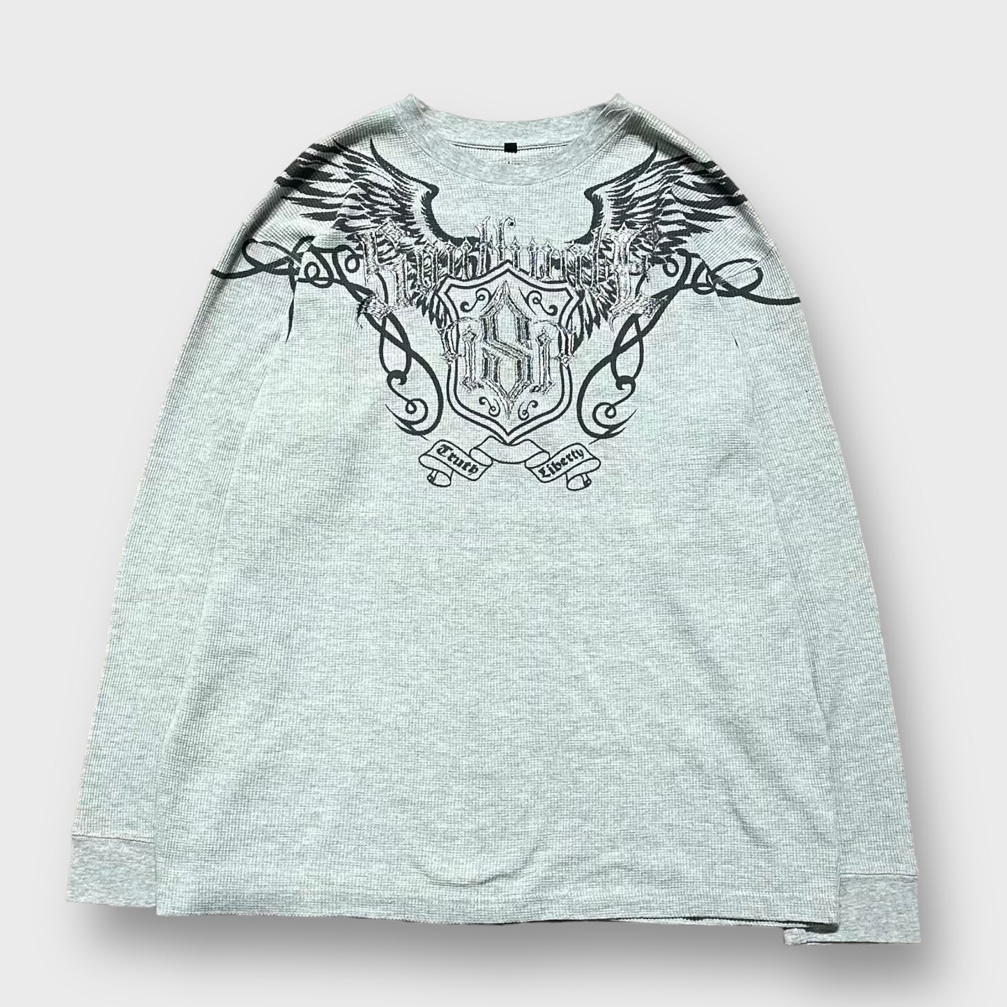 Wing design thermal knit sweater