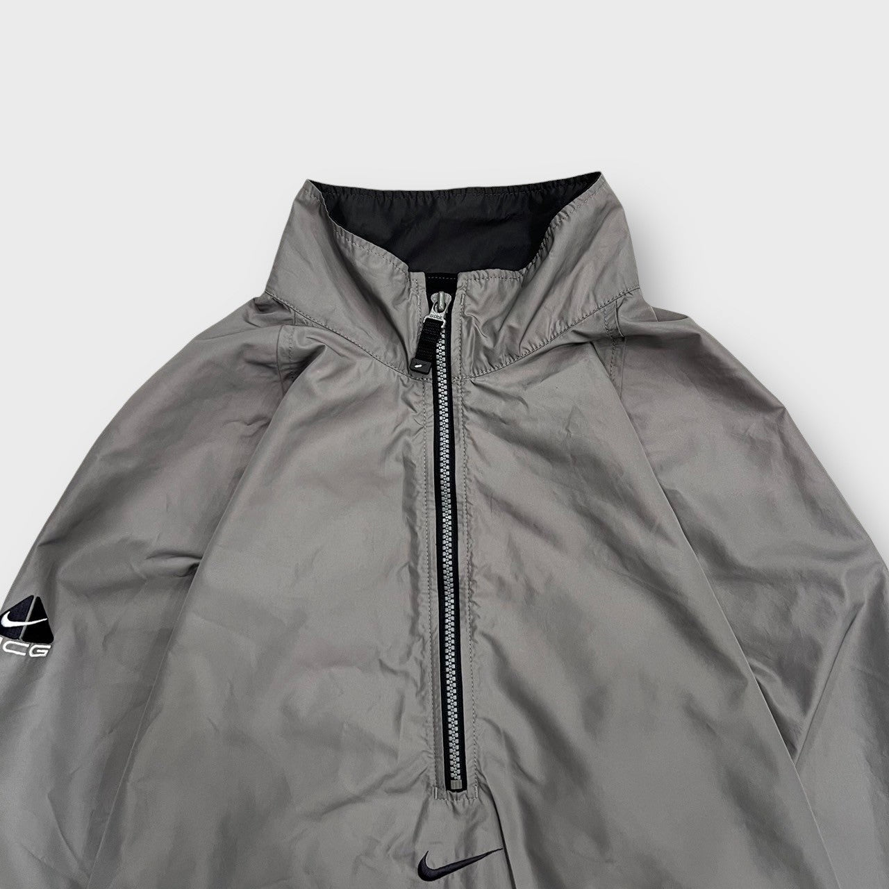 00's "NIKE ACG"
Half zip nylon jacket